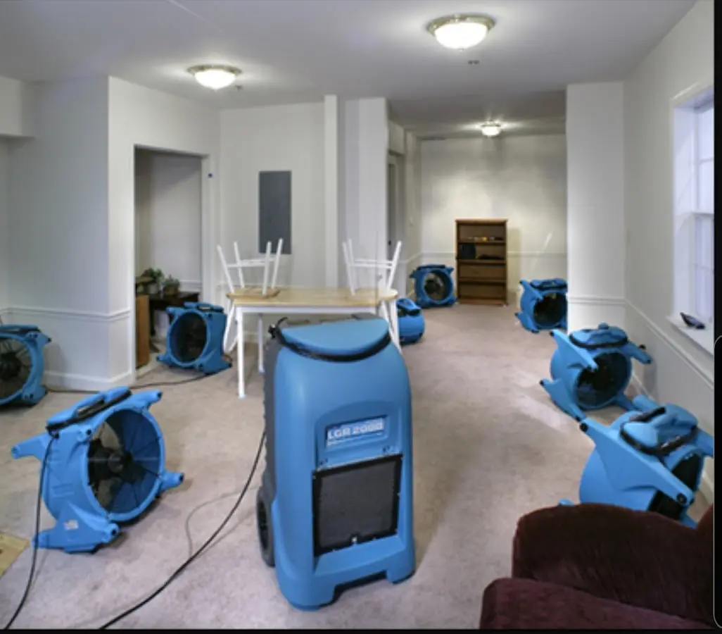 Air movers and dehumidifier setup for Water Damage Restoration in Riverhead
